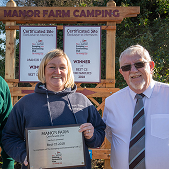 Manor Farm Staff with award