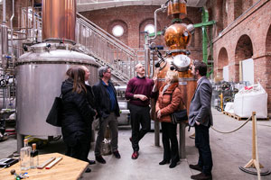 People enjoying their Dockyard Gin distillery tour