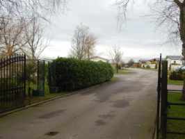 A hedge at the entrance of a holiday park