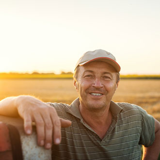 Farmer with a stewardship agreement in field