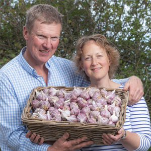Gill and Glen at Craggie farm growing Garlic