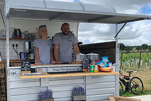 Horsebox bar from Kinsbrook Vineyard with staff serving from the hatch