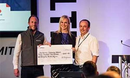 The Farming community receiving cheque