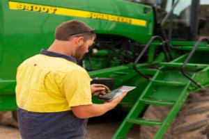 Farmer using software on mobile device